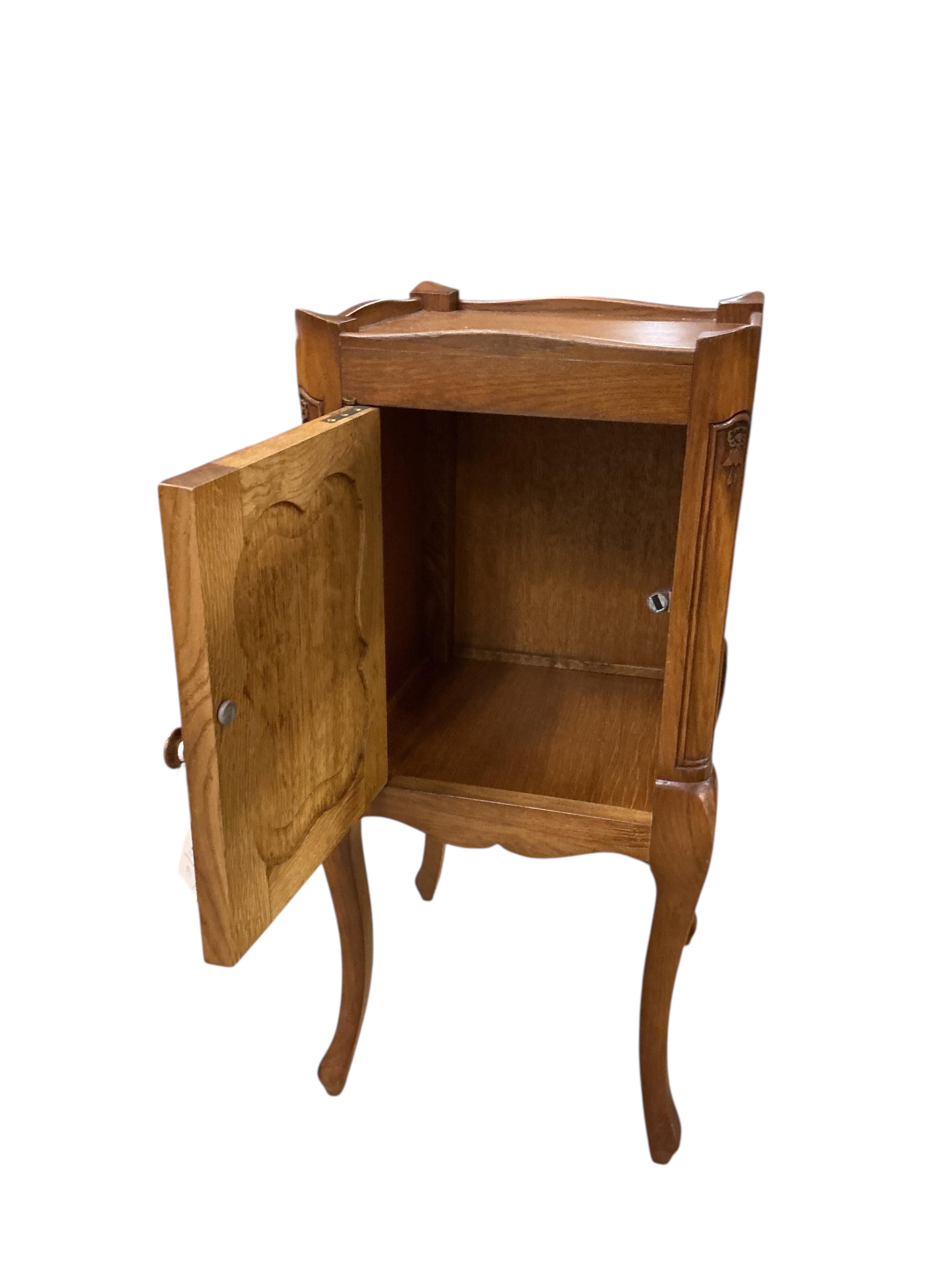 A pair of French oak bedside cabinets, width 34cm, depth 34cm, height 75cm